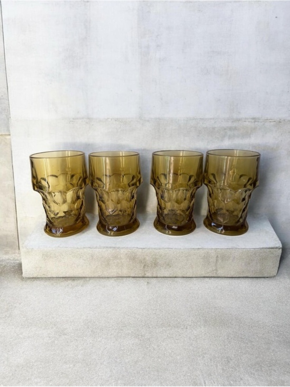 set of  4 Anchor Hocking amber glass tumblers in the Georgian honeycomb pattern.